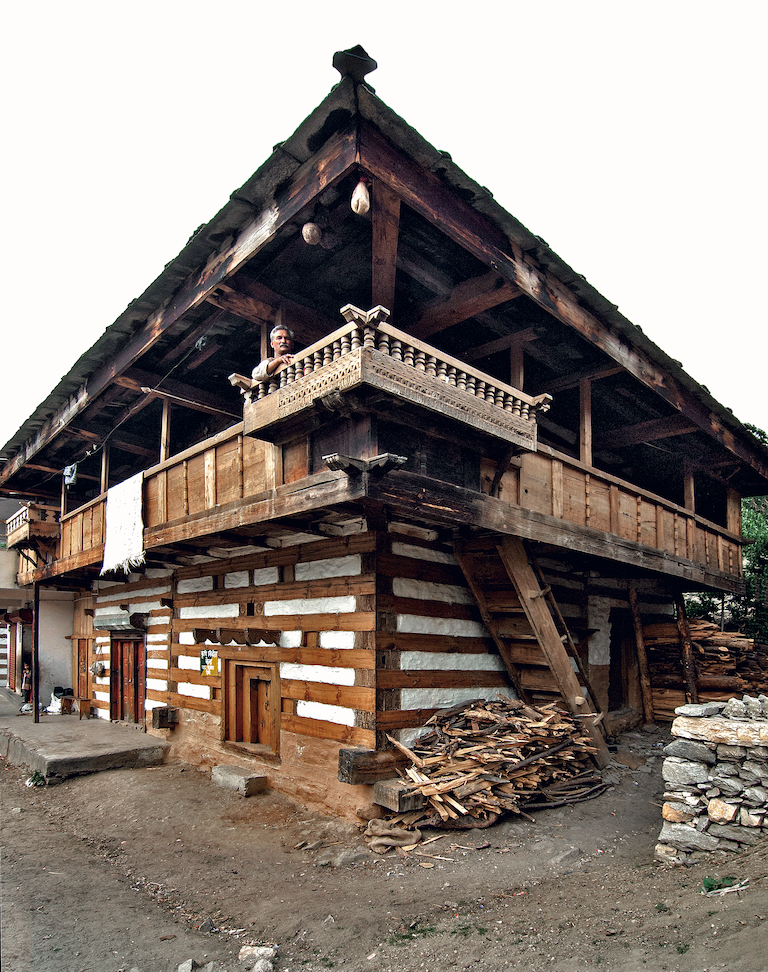 Vernacular style structures being made at Doni, Uttarkashi, Uttarakhand. Houses in this area are still being made in this traditional style. These double-walled timber-bonded stone structures are very sturdy and withstand earthquakes which often visit this region. The wood joinery is in the customary manner without the use of nails and iron. The space between the double walls is filled with rubble for insulation in this cold region. Wood carving techniques are still alive and embellish mainly temple exteriors